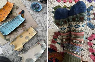 Cat-shaped ceramic plates on table; feet wearing patterned socks